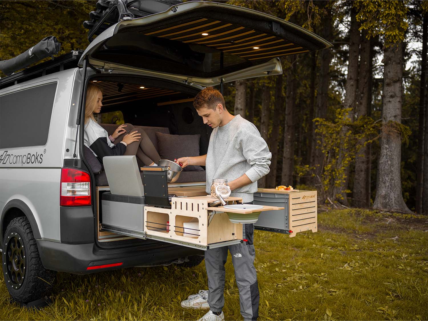 The CampBoks Pro while two people work with it